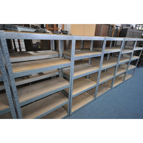 1079 - TWELVE ASSEMBLED GALVANISED RACKING SHELVING, all with five mdf shelves, and a quantity of loose she... 