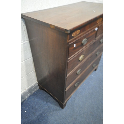 1201 - A GEORGIAN MAHOGANY AND MARQUETRY INLAID CHEST OF TWO SHORT OVER THREE LONG GRADUATED DRAWERS, on br... 