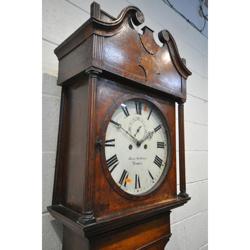 1209 - A GEORGIAN OAK EIGHT DAY LONGCASE CLOCK, the hood with a swan neck pediment, reeded pillars flanking... 