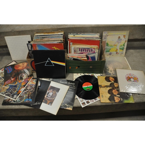 802 - TWO TRAYS CONTAINING OVER ONE HUNDRED AND THIRTY LPs AND 7in SINGLES including  Darkside of the Moon... 