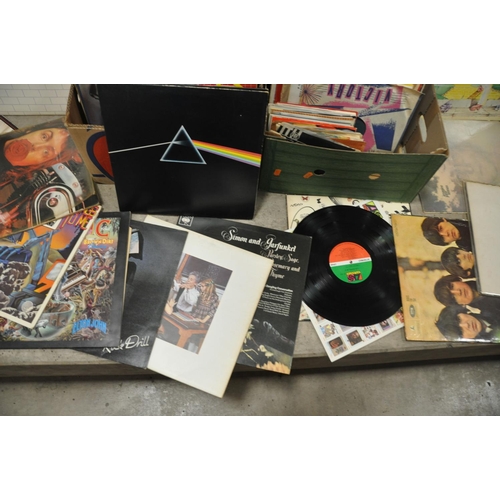 802 - TWO TRAYS CONTAINING OVER ONE HUNDRED AND THIRTY LPs AND 7in SINGLES including  Darkside of the Moon... 