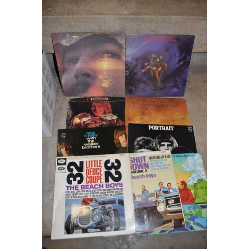 818 - TWO TRAYS CONTAINING OVER ONE HUNDRED LPs AND BOXSETS including Friends, Shut Down Vol 2, and Little... 