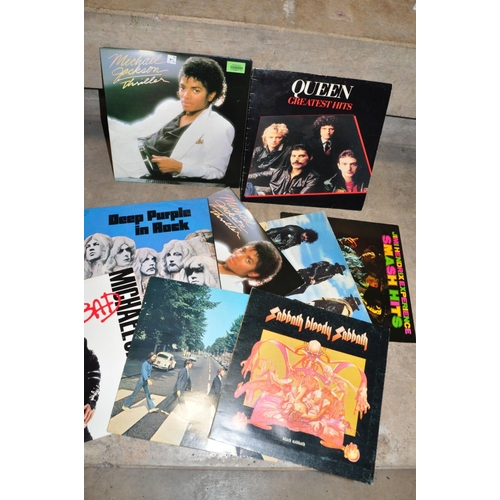 822 - TWO CASES CONTAINING SIXTY LPs, 12in AND 7in SINGLES including Abbey Road ( 1st Pressing) and Love S... 