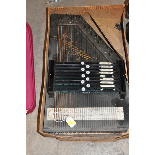 834 - THREE STRINGED MUSICAL INSTRUMENTS comprising of a Schengrin Autoharp in half its original box, a Ch... 