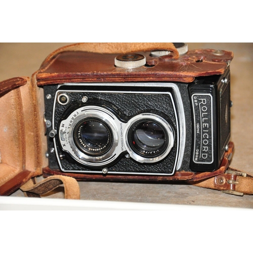 844 - A ROLLEICORD IV K3D TLR CAMERA with a Heidosmat 75mm f3.2 and Xenar 75mm f3.5 lenses  in leather cas... 