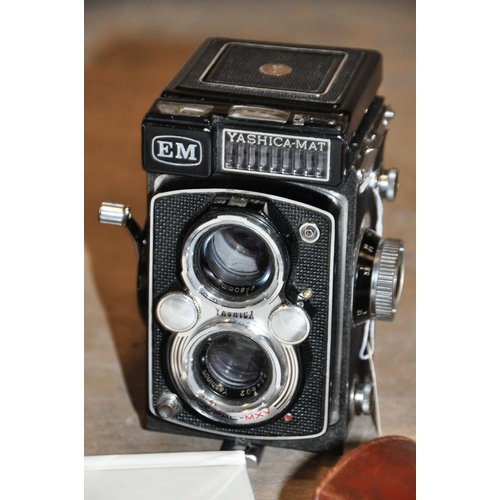 844 - A ROLLEICORD IV K3D TLR CAMERA with a Heidosmat 75mm f3.2 and Xenar 75mm f3.5 lenses  in leather cas... 