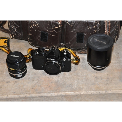 846 - A NIKON FM FILM SLR CAMERA with a Nikkor35-70mm f3.3, Tokina 500mm f8 mirrored lens, a Jessops tripo... 