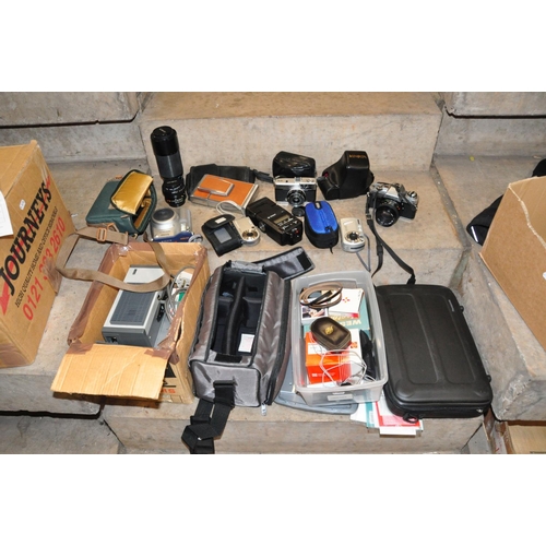 850 - TWO TRAYS CONTAINING CAMERA EQUIPMENT including a Minolta X-300 SLR fitted with a 50mm f1.7 lens, a ... 