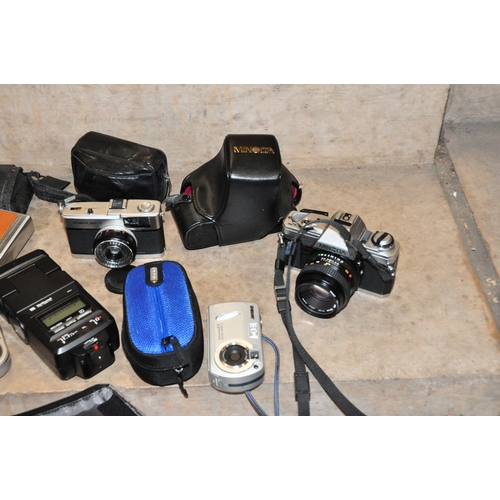 850 - TWO TRAYS CONTAINING CAMERA EQUIPMENT including a Minolta X-300 SLR fitted with a 50mm f1.7 lens, a ... 