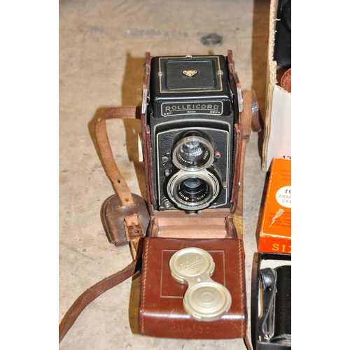 852 - A ROLLEICORD 5 TLR CAMERA with a Heidosmat75mm f3.2 and a Schneider Xenar 75mm f3.5 lens and tatty l... 