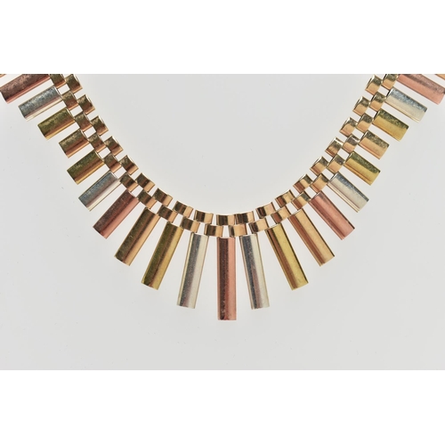 11 - A 9CT ROSE, YELLOW AND WHITE GOLD FRINGE NECKLACE, designed as a series of undulating textured links... 