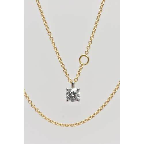 123 - AN 18CT YELLOW AND WHITE GOLD TIFFANY & CO DIAMOND PENDANT NECKLACE, set with a round brilliant cut ... 