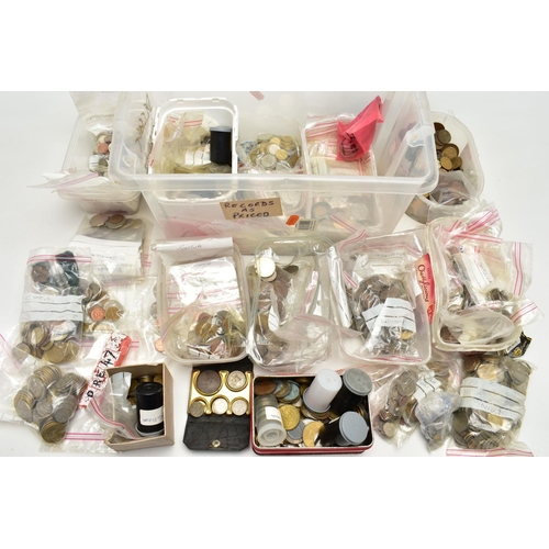 128 - A LARGE AND HEAVY PLASTIC BOX OF WORLD COINS, to include low value coinage from most of the European... 