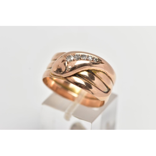 18 - A 9CT COILED SNAKE RING, wide band of a coiled snake, the head is set with five graduated round bril... 