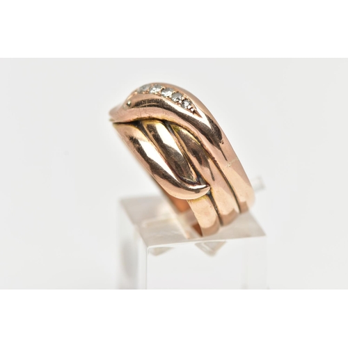 18 - A 9CT COILED SNAKE RING, wide band of a coiled snake, the head is set with five graduated round bril... 