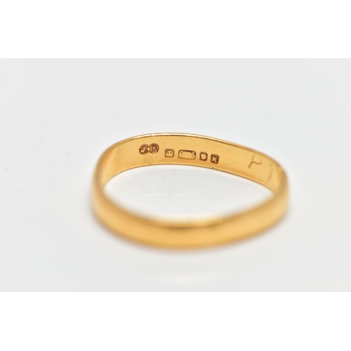 20 - A 22CT GOLD BAND RING, misshapen polished band, approximate band width 2.8mm, hallmarked 22ct London... 