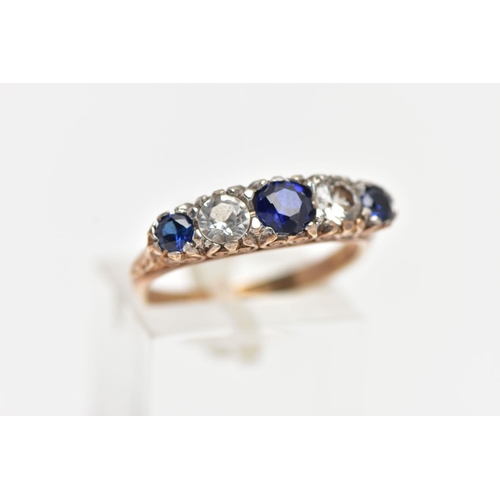 27 - A 9CT YELLOW GOLD FIVE STONE RING, set with three circular cut blue sapphires and two circular cut c... 