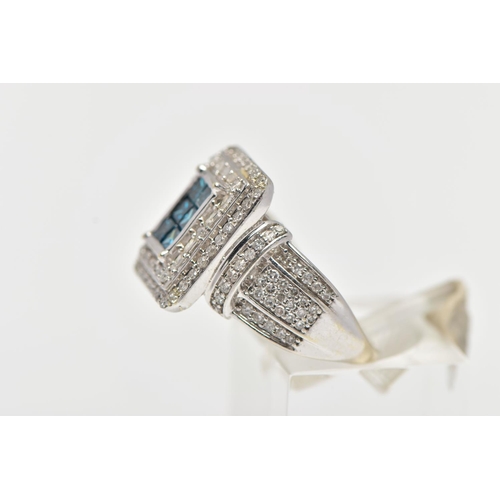 32 - A WHITE METAL DIAMOND DRESS RING, of a rectangular form, to the centre is six princess cut blue diam... 
