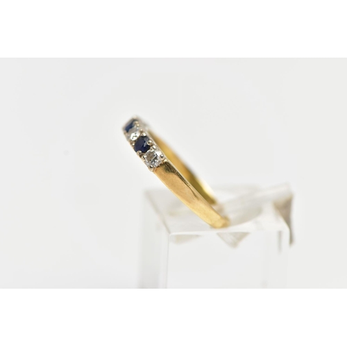 34 - A YELLOW METAL SAPPHIRE AND DIAMOND HALF ETERNITY RING, designed with a row of four claw set, round ... 