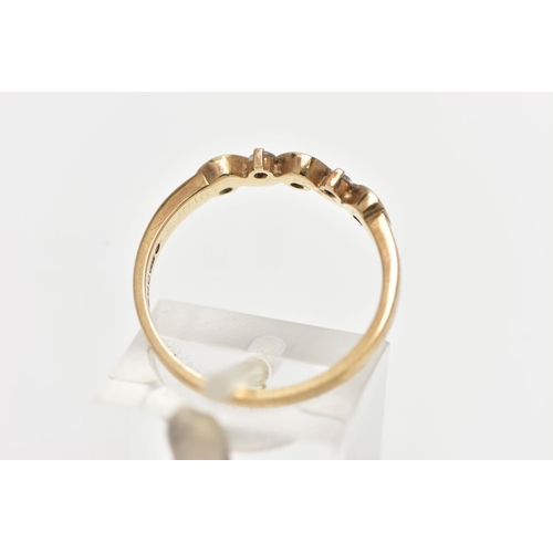 35 - A 9CT GOLD DIAMOND RING, designed as a wavy half eternity ring, set with five round brilliant cut di... 