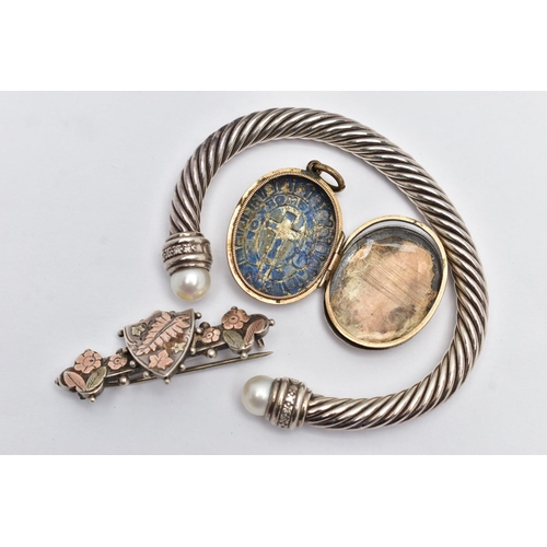 36 - A TORQUE BANGLE, LOCKET AND A SWEETHEART BROOCH, the torque bangle of a twisted rope design, each te... 