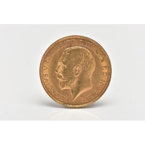 38 - AN EARLY 20TH CENTURY HALF SOVEREIGN COIN, obverse depicting George V, reverse depicting George and ... 