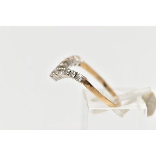 42 - A 9CT YELLOW GOLD DIAMOND WISHBONE RING, designed with a row of eleven claw set, round brilliant cut... 