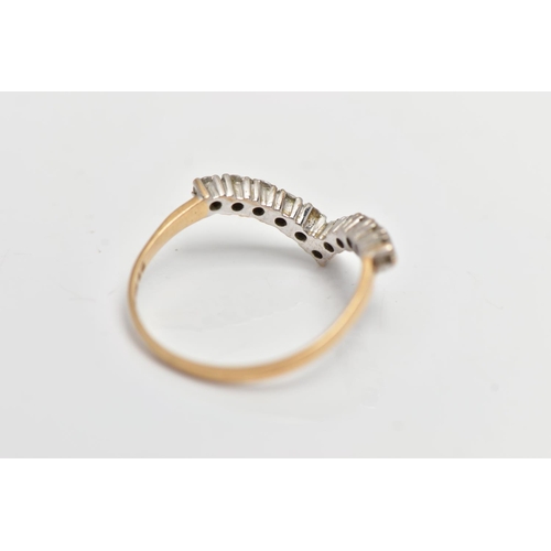 42 - A 9CT YELLOW GOLD DIAMOND WISHBONE RING, designed with a row of eleven claw set, round brilliant cut... 