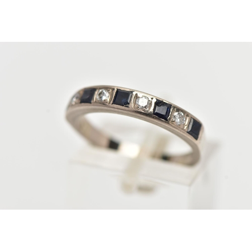 43 - A WHITE METAL SAPPHIRE AND DIAMOND HALF ETERNITY BAND RING, set with four round brilliant cut diamon... 