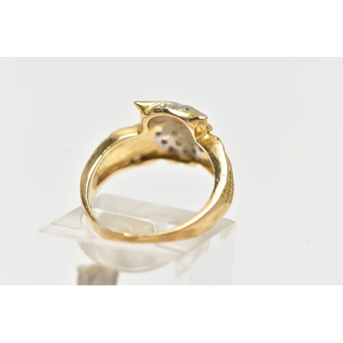 49 - A YELLOW METAL GEM SET RING, in the form of an owl with spread wings, the body is set with single cu... 