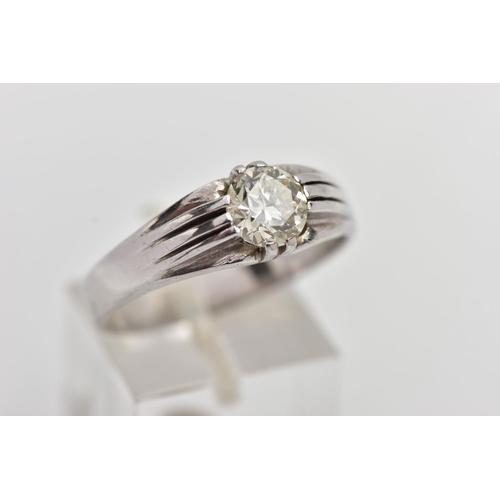 5 - A WHITE METAL DIAMOND SINGLE STONE RING, set with an early brilliant cut diamond, measuring approxim... 