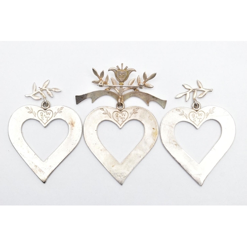 50 - A LARGE WHITE METAL HEART BROOCH AND MATCHING EARRINGS, large openwork hearts with diamond pattern s... 