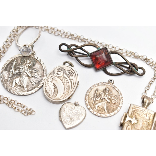 51 - A SMALL BAG OF JEWELLERY, to include two circular St. Christopher pendants, one signed 'Georg Jensen... 