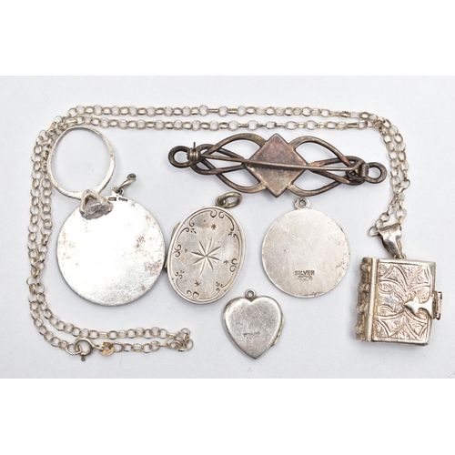 51 - A SMALL BAG OF JEWELLERY, to include two circular St. Christopher pendants, one signed 'Georg Jensen... 