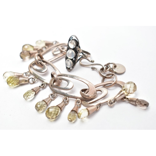 56 - A GEM SET BRACELET AND A MOONSTONE RING, the  bracelet designed with four openwork oval links, inter... 