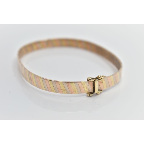 70 - A 9CT GOLD TRI COLOUR HINGED BANGLE, bangle width 6.3mm, fitted with an integrated box clasp with tw... 