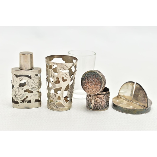 82 - FOUR WHITE METAL ITEMS, to include a glass cup with an openwork white metal floral case, hallmarked ... 