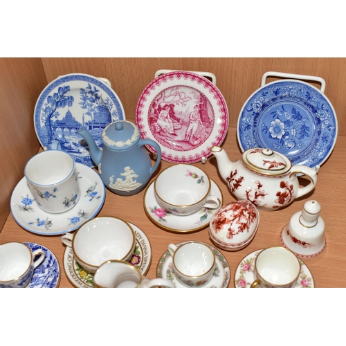 357 - A COLLECTION OF ASSORTED MINIATURE TEAWARES, comprising a Wedgwood blue Jasper Ware coffee pot, a Co... 