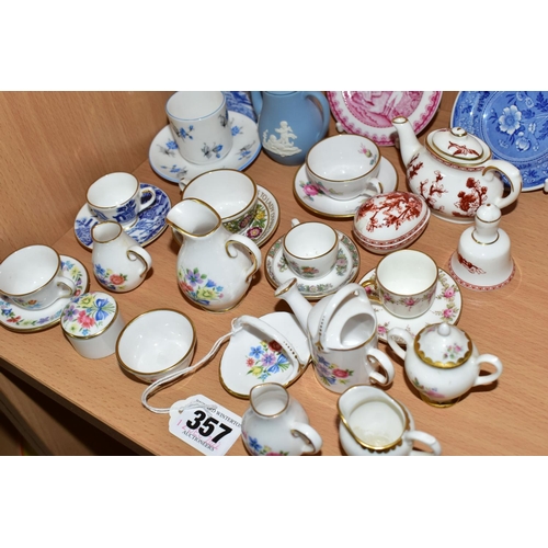 357 - A COLLECTION OF ASSORTED MINIATURE TEAWARES, comprising a Wedgwood blue Jasper Ware coffee pot, a Co... 