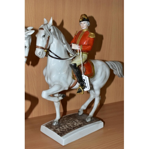 366 - TWO UNTERWEISSBACH PORCELAIN HORSES AND RIDERS, the riders in military style uniform with red and go... 