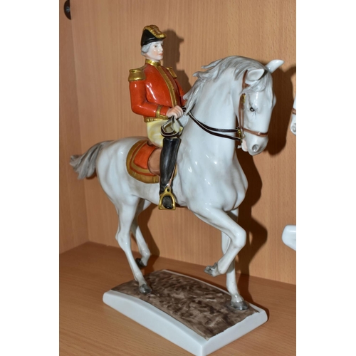 366 - TWO UNTERWEISSBACH PORCELAIN HORSES AND RIDERS, the riders in military style uniform with red and go... 