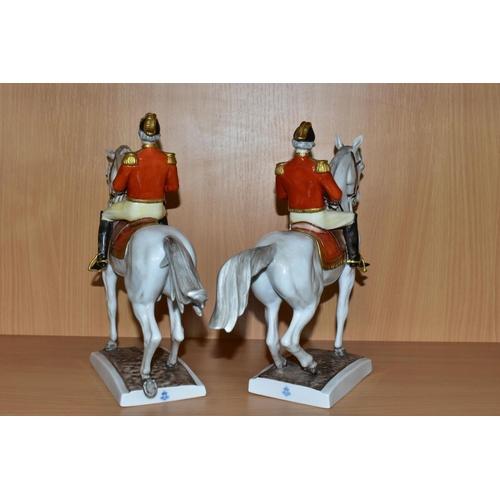 366 - TWO UNTERWEISSBACH PORCELAIN HORSES AND RIDERS, the riders in military style uniform with red and go... 