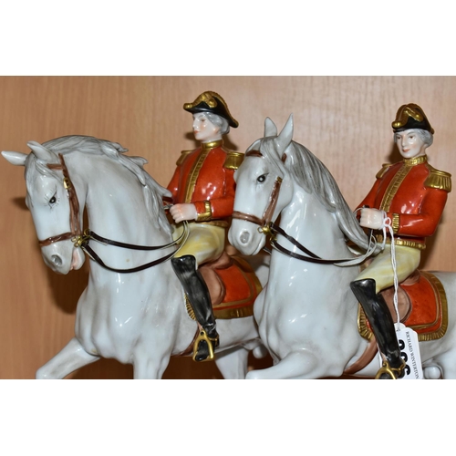 366 - TWO UNTERWEISSBACH PORCELAIN HORSES AND RIDERS, the riders in military style uniform with red and go... 