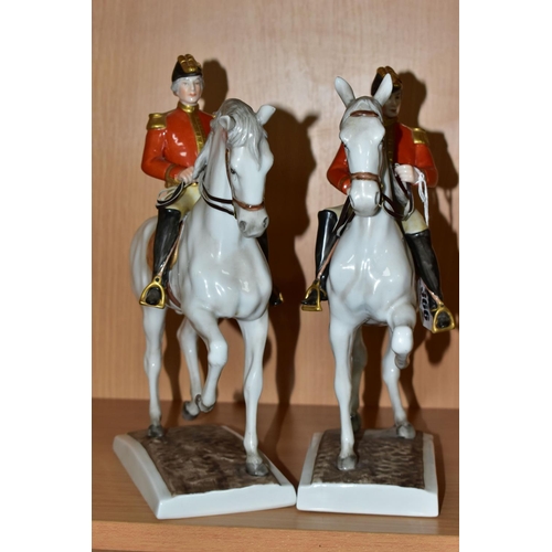 366 - TWO UNTERWEISSBACH PORCELAIN HORSES AND RIDERS, the riders in military style uniform with red and go... 