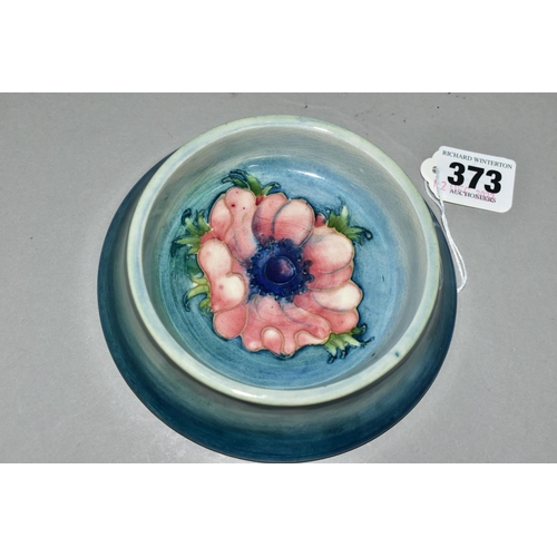 373 - A MOORCROFT POTTERY ANENOME BOWL, of unusual form with a flared foot, graduated blue ground, impress... 