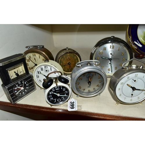 399 - A COLLECTION OF NINE VINTAGE BEDSIDE ALARM CLOCKS, comprising three Jaz French alarm clocks, an Art ... 