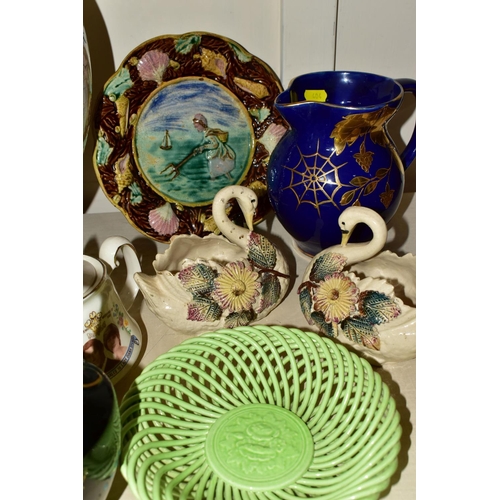 404 - A GROUP OF CERAMICS, comprising a Majolica 'Shrimper' wall plate (historic chips and missing paint),... 