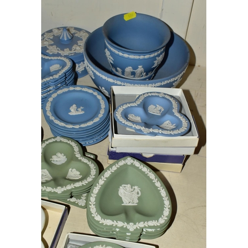 406 - A LARGE QUANTITY OF WEDGWOOD JASPER WARE, comprising blue Jasperware two bowls, planter, jug, vase, ... 