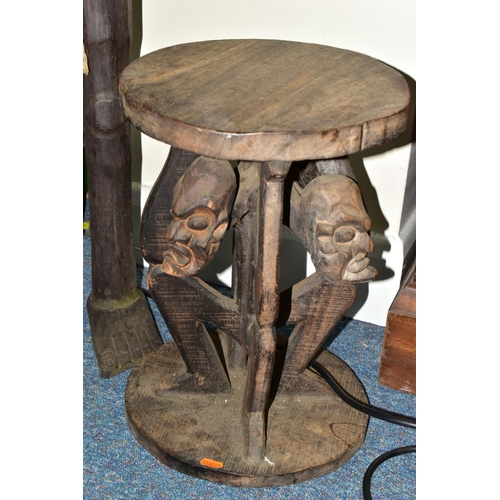 407 - A CARVED WOODEN STOOL AND TRIBAL FIGURE, comprising a carved figural stool, height 41cm, together wi... 