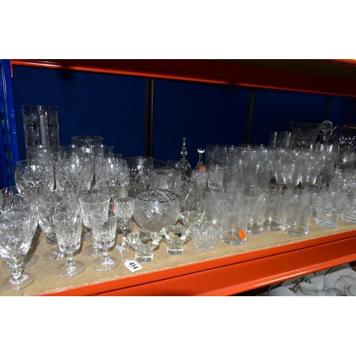 414 - A QUANTITY OF CUT CRYSTAL AND GLASSWARES, comprising a Waterford Lismore pattern ship's decanter, a ... 